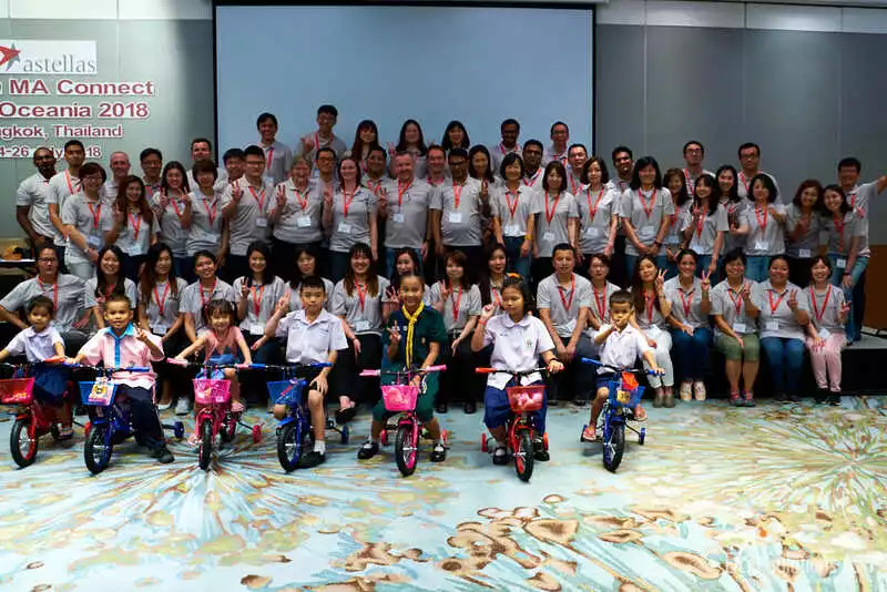 Astellas CSR team build group with children Thailand