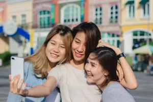 Ladies taking a selfie as part of a photo hunt activity