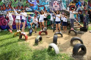 Team members having fun in a local park Bangkok