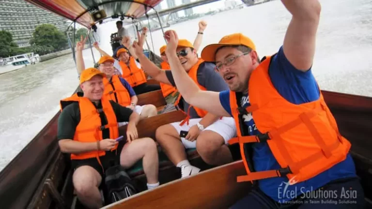 Teams having fun on a longtail boat Bangkok